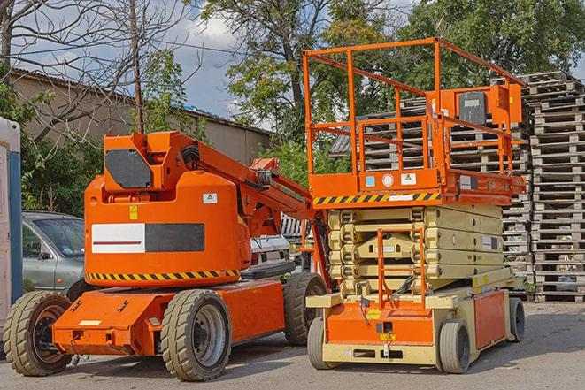 forklift moving heavy loads in busy warehouse setting in Albany, CA